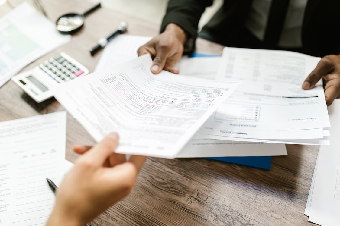 Free Handing Out of Documents Stock Photo