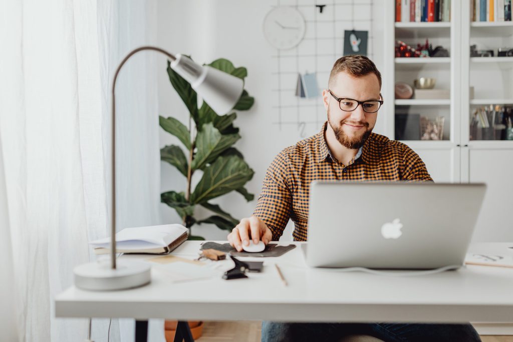 Man Using a Macbook